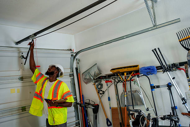 Professional Garage Door Panel Replacement technician working in Peach County County, GA